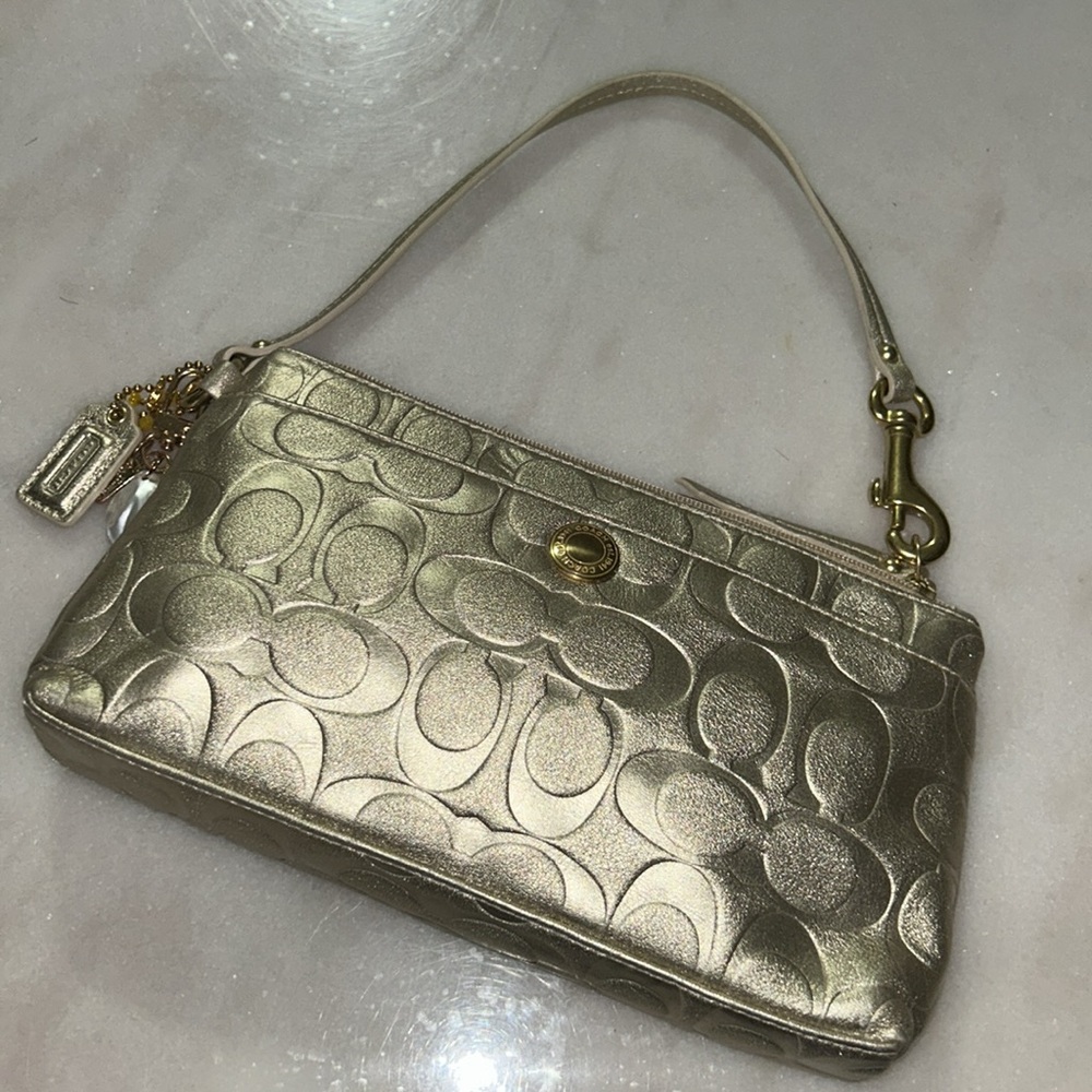 • COACH GOLD MINI BAG